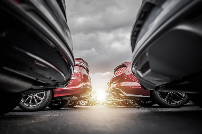 Fleet of cars and sunset